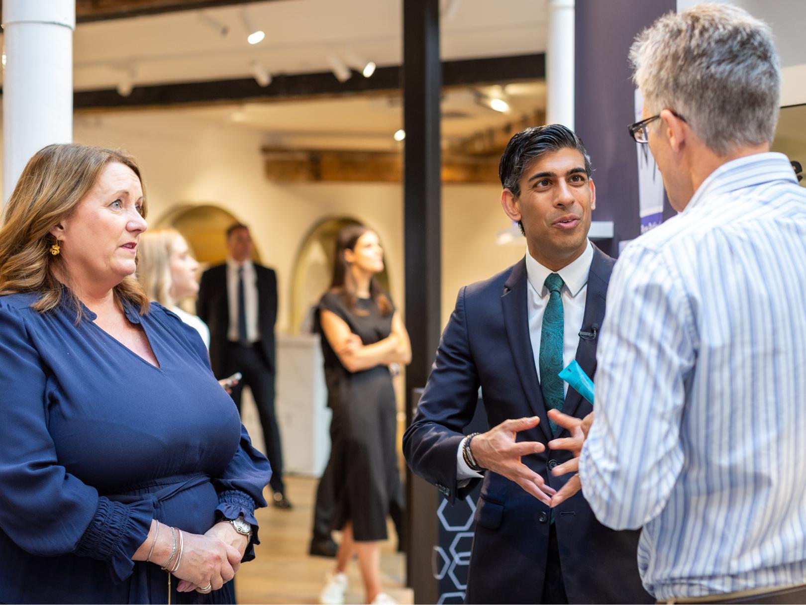 Rishi Sunak (UK Chancellor) and Annie Murphy talking to Dr Mike Bell